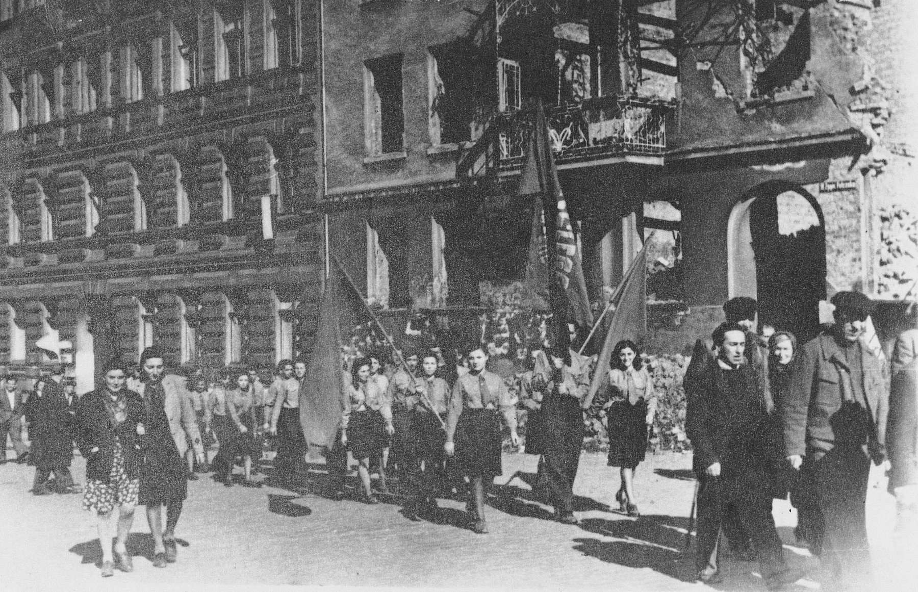 Helena Storch marches in a parade to commemorate the anniversary of the Warsaw ghetto uprising.