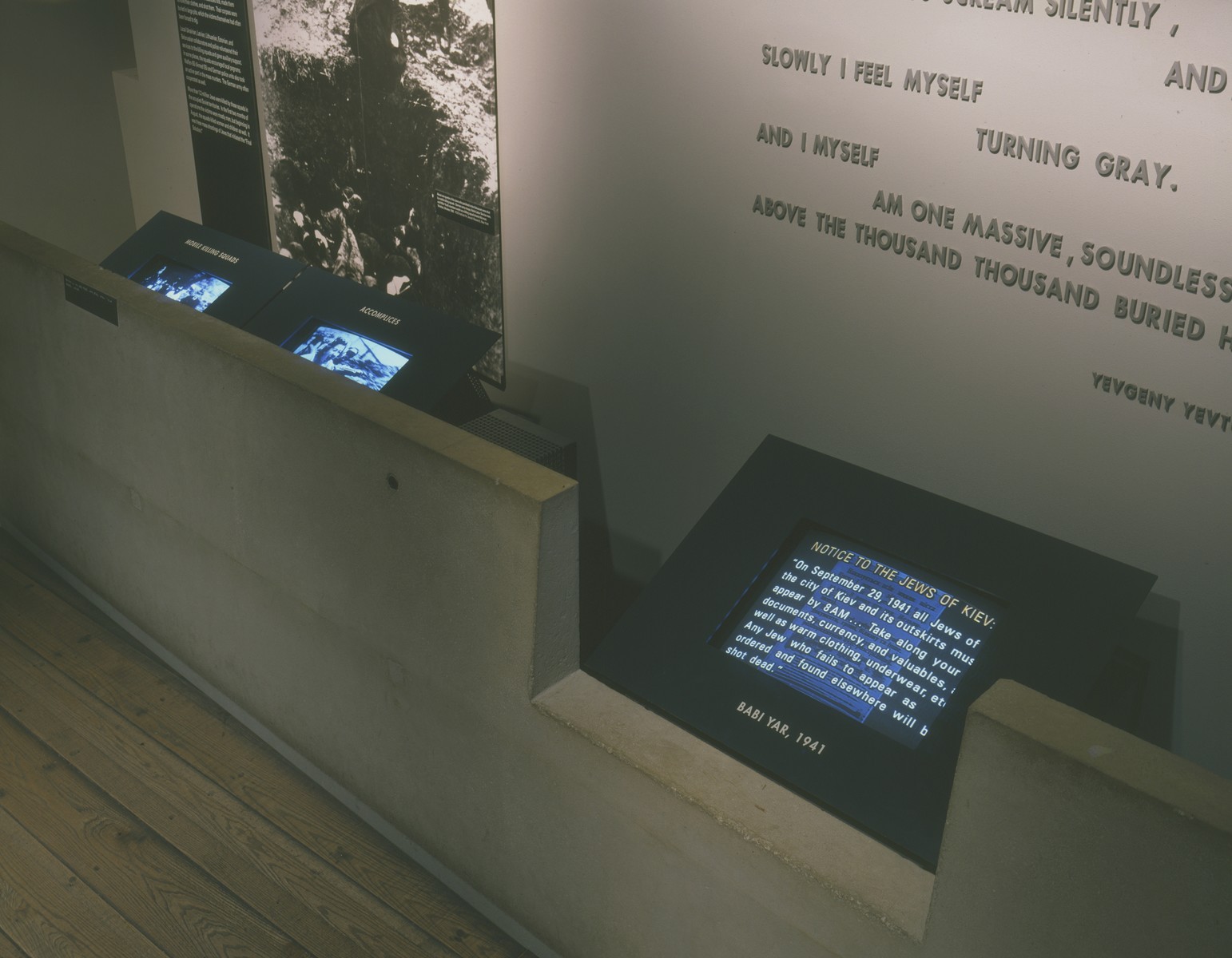 Monitors accompanying the Babi Yar and mobile killing squads segment on the third floor of the permanent exhibition at the U.S. Holocaust Memorial Museum.
