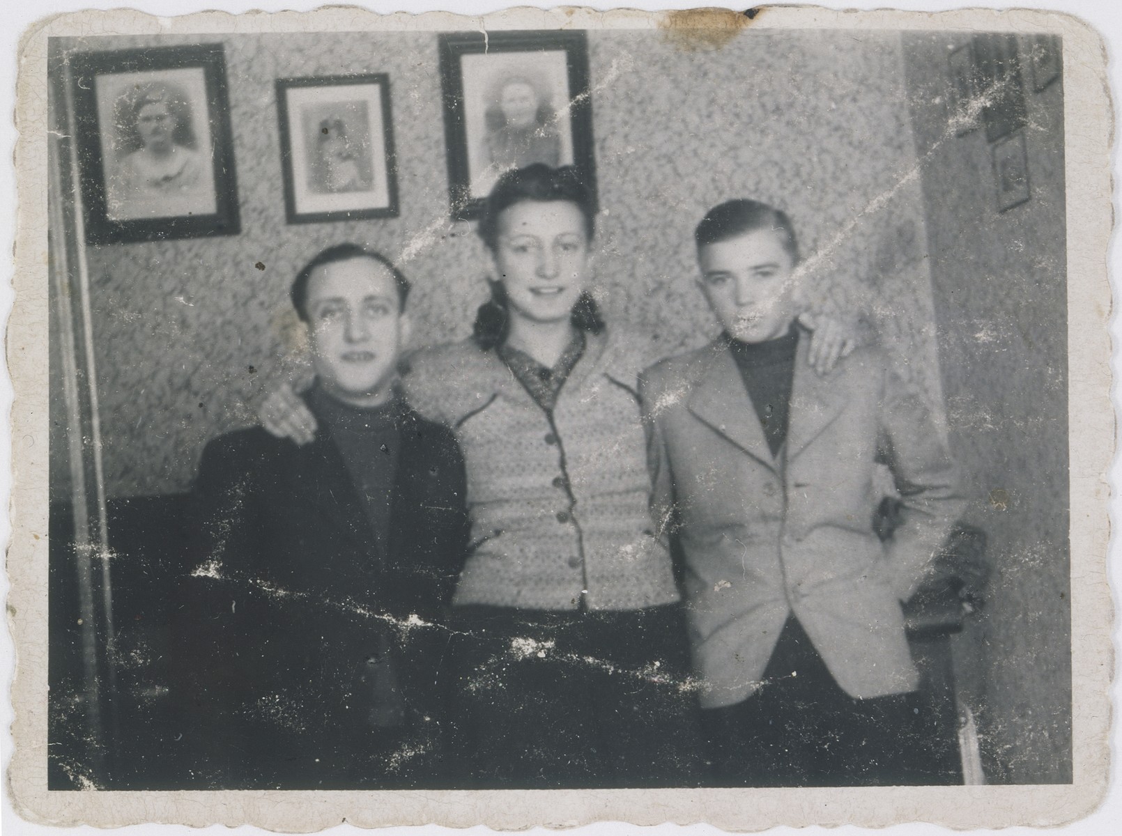 Jan Kostanski (right) poses with Fela Wierzbicka and her husband Szmulek in the Warsaw ghetto.

Fela was eight months pregnant in this photo.  She was killed shortly thereafter by the Germans and her husband, Szmulek, went mad upon hearing the news.
