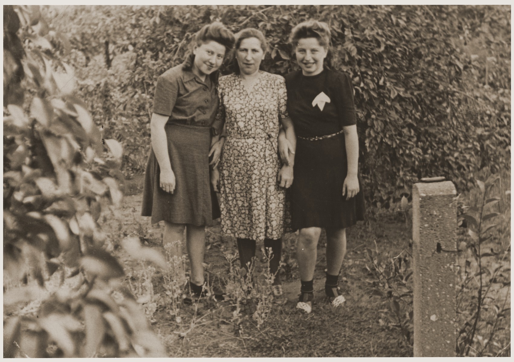 A Jewish mother poses with her two daughters at the Fuerth displaced persons camp.

Pictured are Cyla Goldman with her daughters, Hania (right) and Rachela (left).