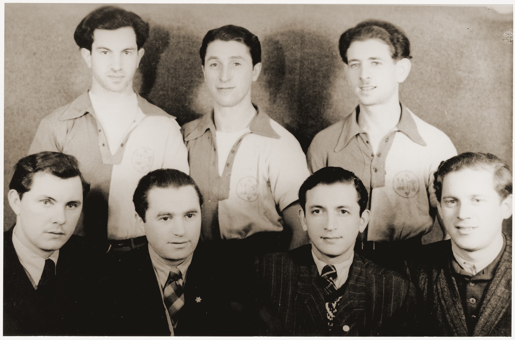 Group portrait of members of a sports team at the Feldafing displaced persons camp.