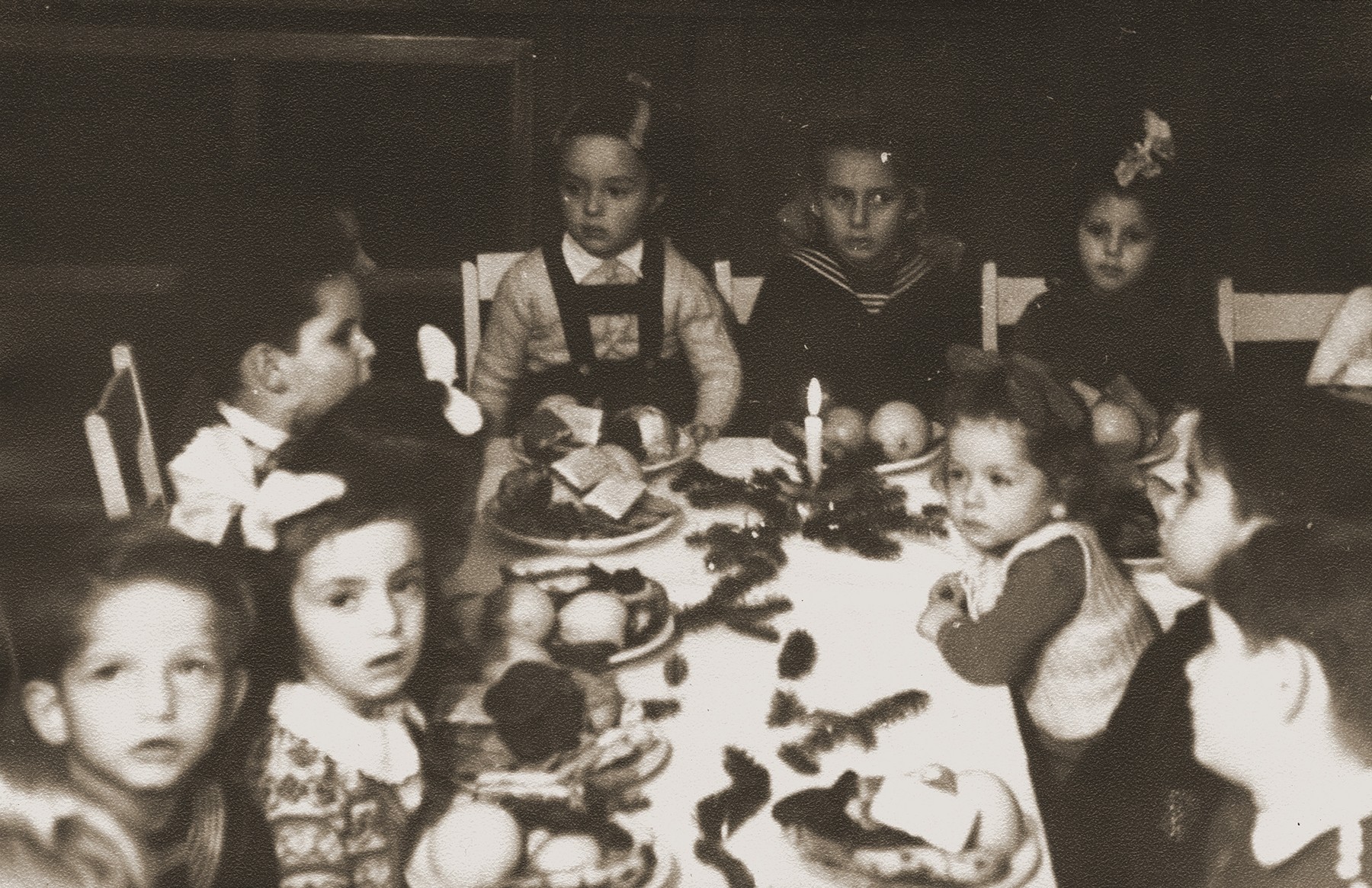 Pre-school children who were born in  the Bergen-Belsen displaced persons' camp, attend a birthday party at the camp.