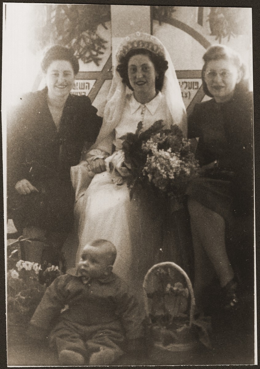The wedding of Ibby Neuman and Max Mandel at the Bad Reichenhall displaced persons' camp.

On the right is Gertrude Ferencz nee Fried, a cousin of the bride.  She was working as an administrator for the office of Chief of Counsel, War Crimes, Nuremberg.