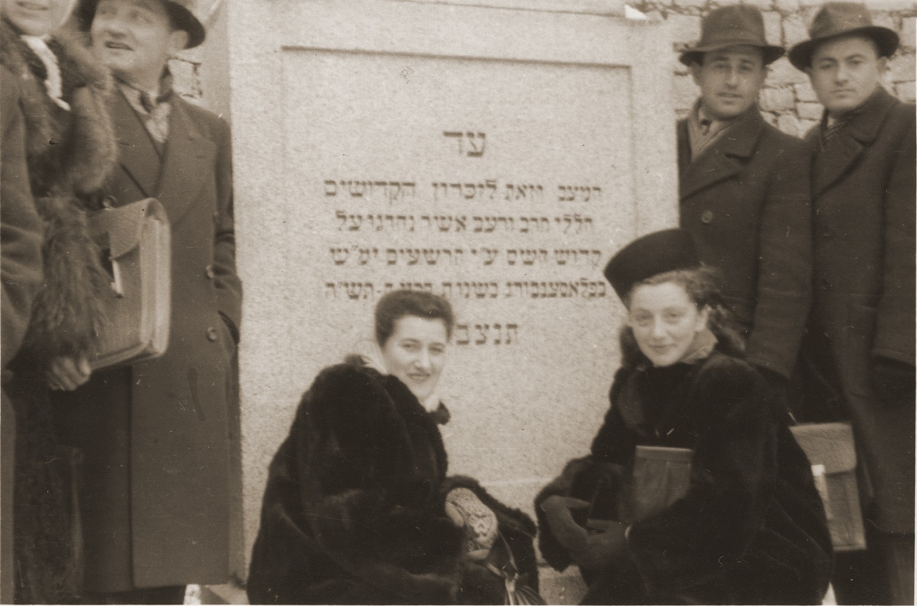Hinda Chilewicz (left) and Sala Weingarten view a memorial for Jewish victims at the Flossenbuerg concentration camp.