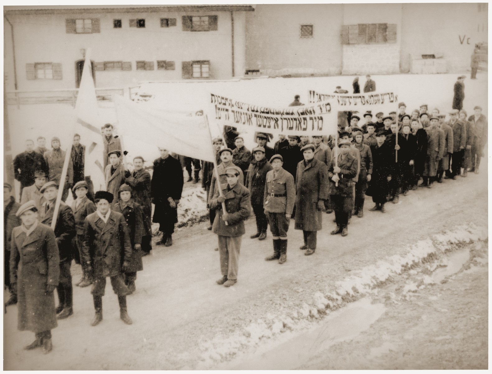 Jewish DPs at the Feldafing displaced persons camp march in protest against the refusal of the British government to open the gates of Palestine to Jewish immigration.