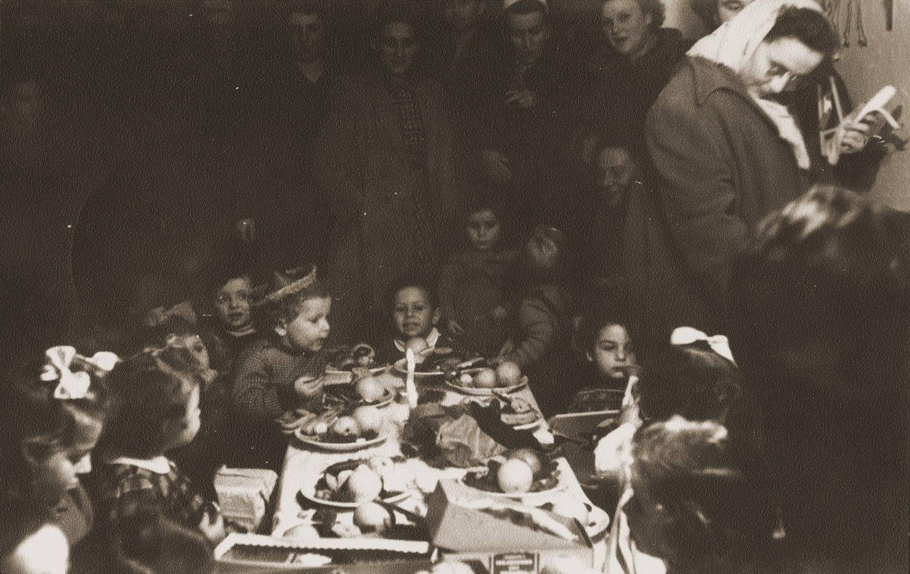 Pre-school children who were born in  the Bergen-Belsen displaced persons' camp, attend a birthday party at the camp.