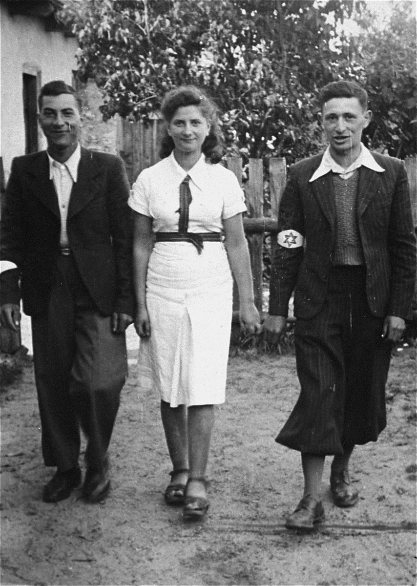Three members of the Hashomer Hatzair Zionist collective on their farm in Zarki.

Pictured from left to right are: Motek Weinryb, Lodzia Hamersztajn and Berel Lemel.