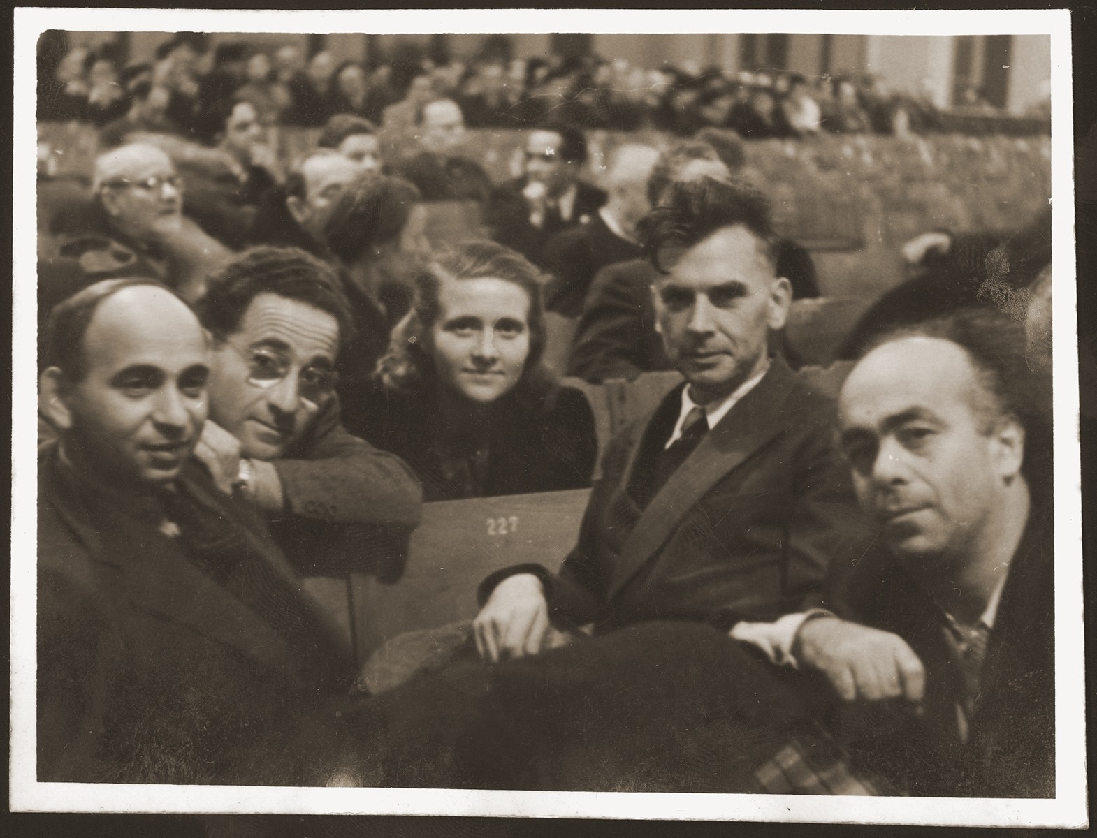 Delegates to the twenty-second World Zionist Congress in Basel.  

Pictured from right  to left are: Avraham Shlonsky (Hebrew poet), Moshe Pomerantz, Haika Grosman, Josef Jambor (editor of a Hungarian newspaper), and Chanan Rubin (head of the socialist league in Palestine).
