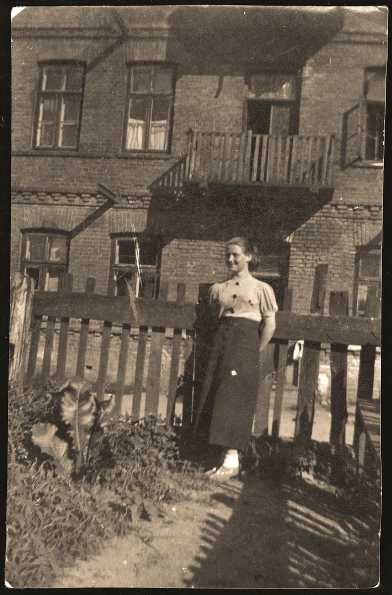 Haika Grosman poses in front of the home of her friend and future husband, Meir Orkin, in Bialystok.

Meir Orkin took this photo on the eve of his departure for Palestine in 1936.