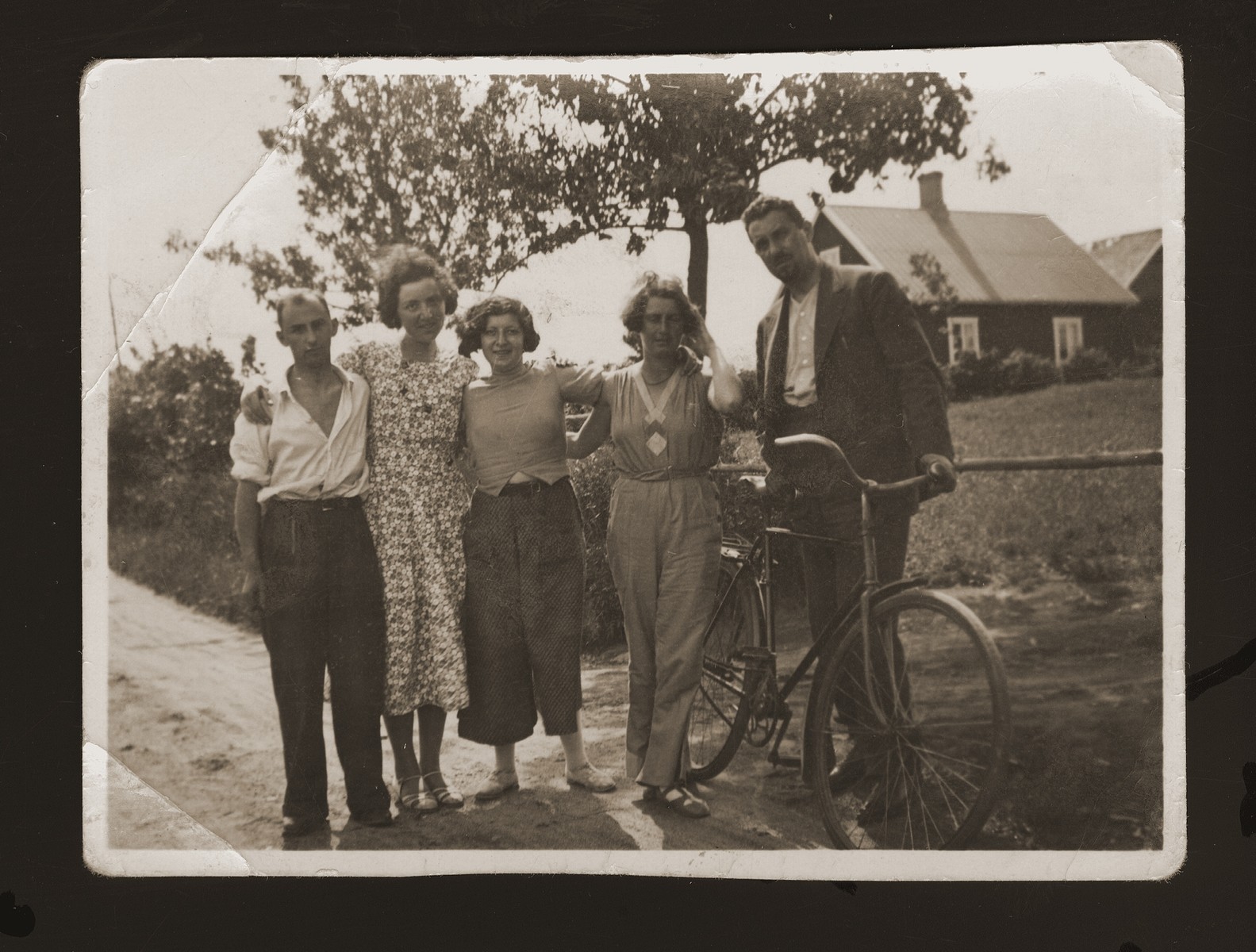 Eugene Goldberger poses with Danish acquaintances shortly after moving to Copenhagen.