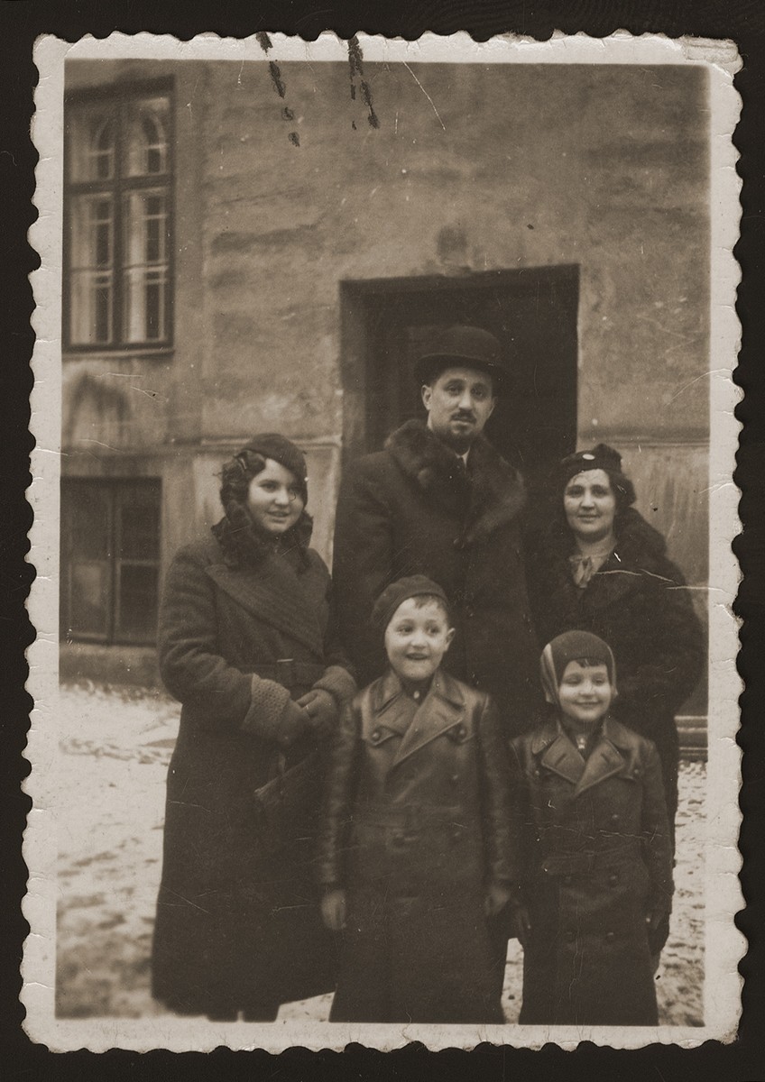 Portrait of Helen (Berkovic) Goldberger, Eugene Goldberger and their sons Milan and Leo taken shortly before the family moved to Denmark.