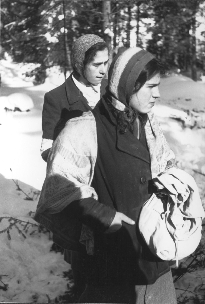 Local Jewish women, one wearing an armband, photographed by Jewish conscripts in the Hungarian Labor Service.