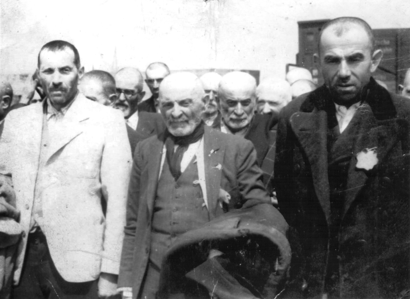 Jews from Subcarpathian Rus await selection on the ramp at Auschwitz-Birkenau.