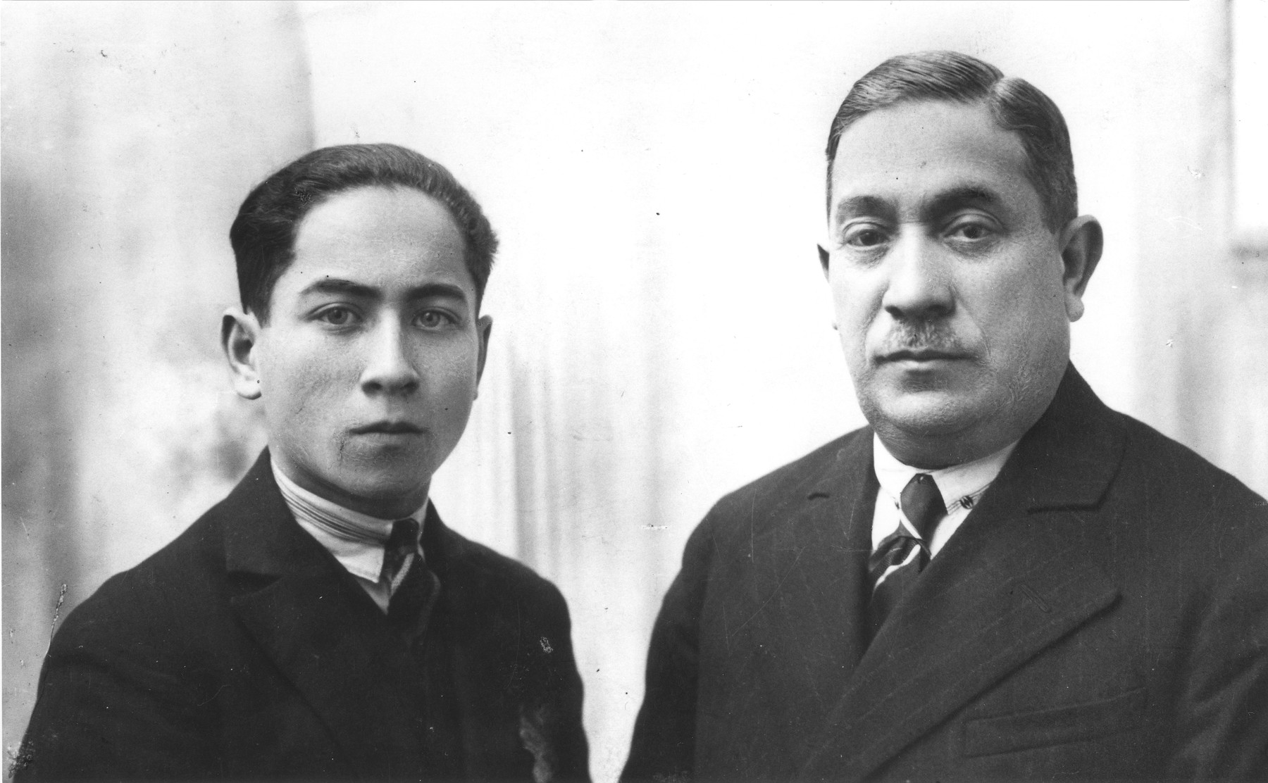 Portrait of two members of the Goldfajs family in Warsaw.

Pictured are the donor's maternal uncle and grandfather, Z. Goldfajs.  Both men perished during the war.