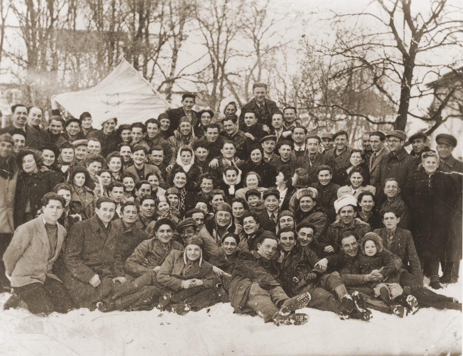 Group portrait of the members of the Zionist hachshara, Kibbutz Negev, in the Landsberg displaced persons camp, which was made up largely of former partisans.

Among those pictured is Tewel Leibowitz.