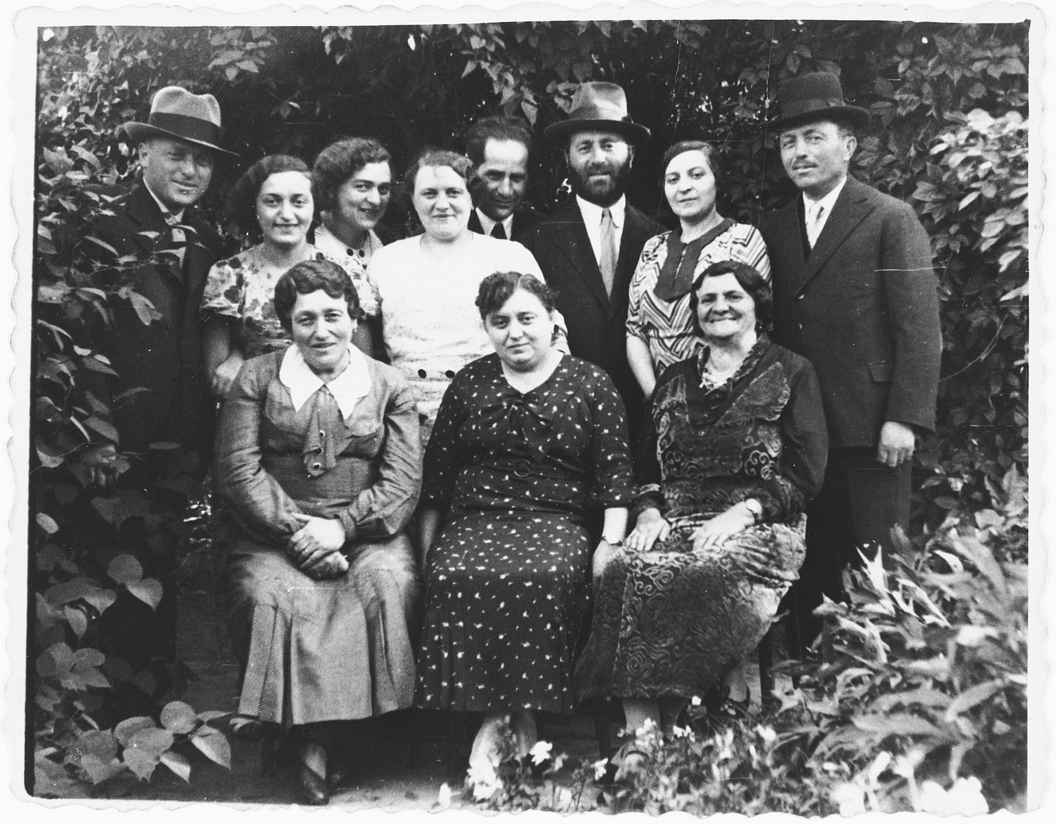 Group portrait of members of the extended Jam family in Rzeszow, Poland.

Among those pictured are Isaac and Ida (Jam) Friedberg (back row, center, Isaac is bareheaded and Ida is wearing a white blouse), and Dora, Regina, Efraim, Josef, and Memel Jam.