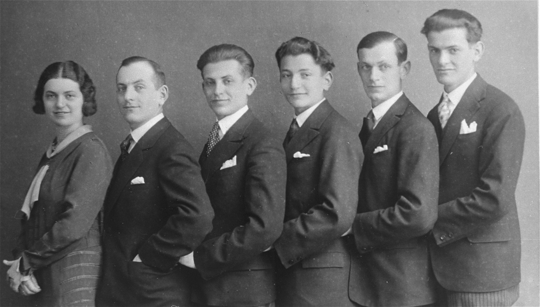 Group portrait of six Jewish siblings in Pozega, Croatia.

Pictured are the children of Julius and Rosa (Gruenwald) Klein.  From left to right are: Blanka (Klein) Kupfermann, Zlatan, Zdenko, Bruno, Milan, and Dragan Klein.  All of the men perished during the Holocaust.
