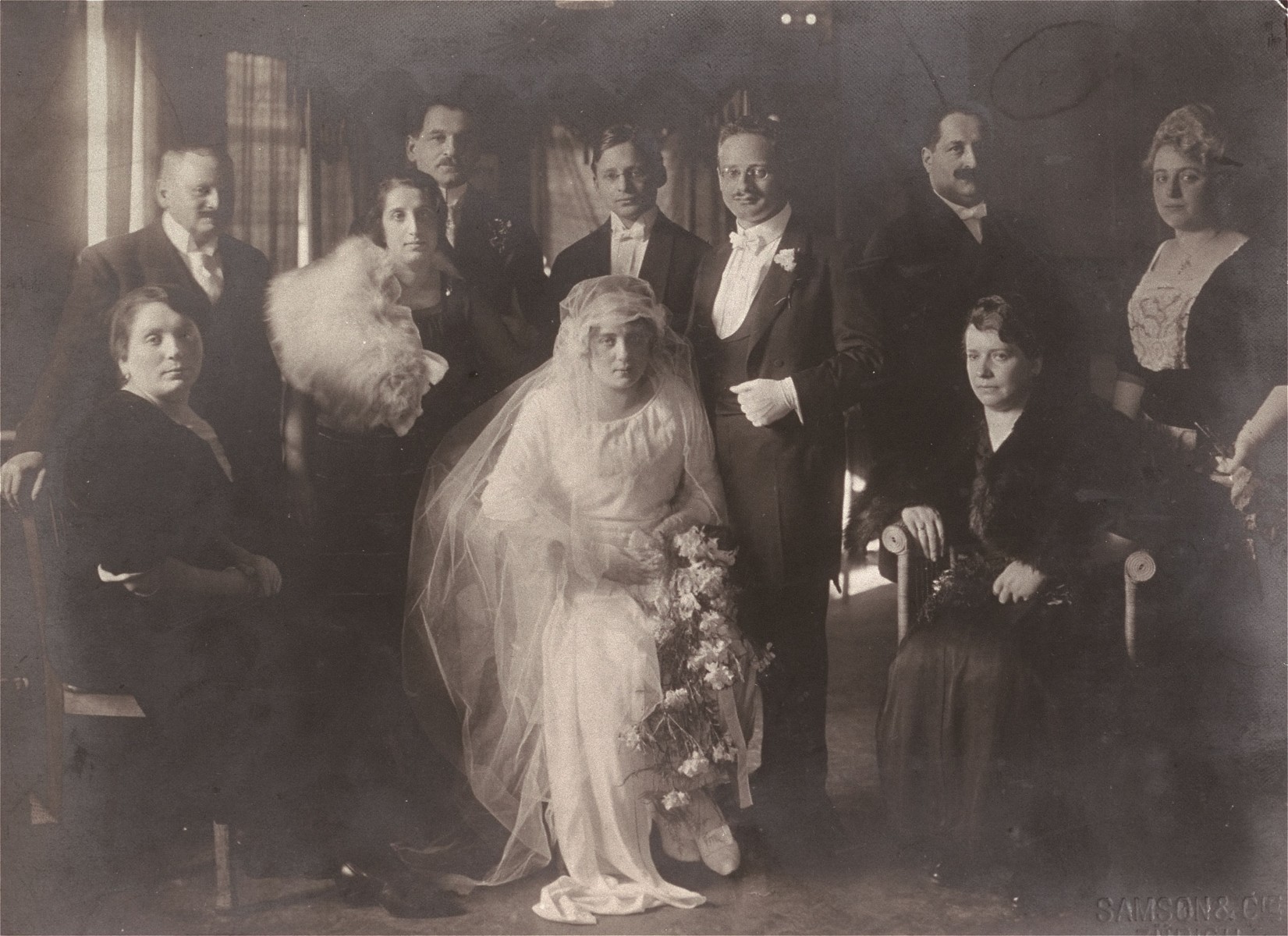 Portrait of the Braunschweig family at the wedding of Klara Braunschweig Woltar and Egon Kafka.
  
Pictured from left to right are: Leone and Leopold Blatt (Klara's sister and brother-in-law); Isaac Braunschweig (Klara's half brother) and his wife; and Herbert Braunschweig (Klara's brother); Egon Kafka; Rene and Bertha (Braunschweig) Weil (Klara's brother-in-law and sister). Sitting on the right is Regine Braunschweig (Klara's half sister).