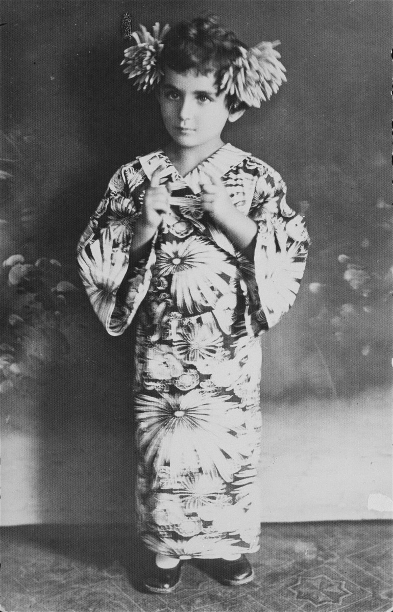 Portrait of a Jewish child dressed in a costume for Purim.

Pictured is Leila Brichta, the daughter of Slavko Brichta and the second cousin of the donor.  She immigrated to the United States before World War II.