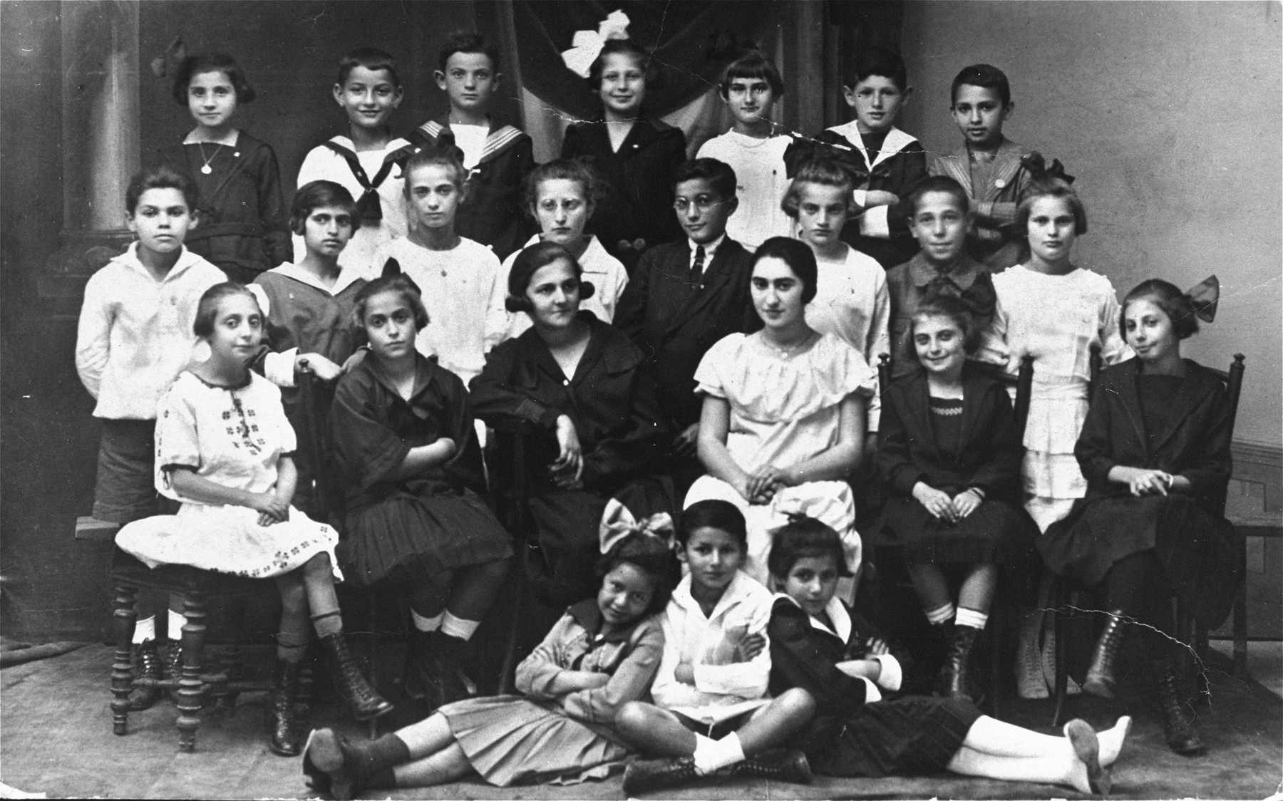 Group portrait of the members of a Zionist youth group in Pozega, Croatia.

Among those pictured is Bruno Klein (top row, second from the left), the uncle of the donor.