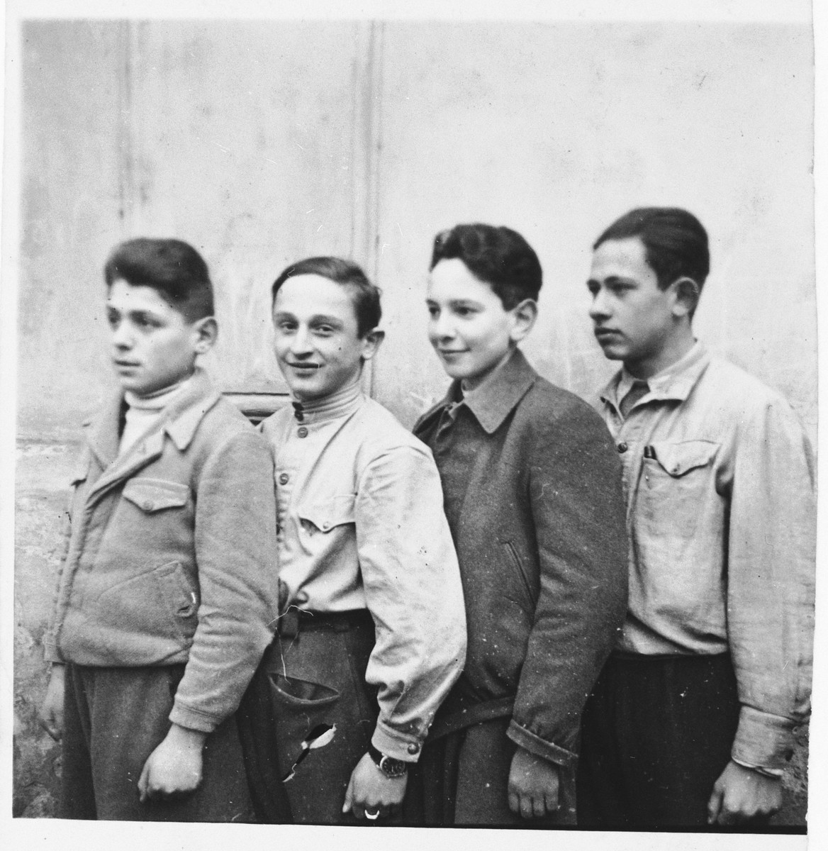 Marcel Koller poses with three friends from a young pioneers school in Cernauti after his family's return from Transnistria.

Marcel Koller is standing second from the right in a dark jacket.