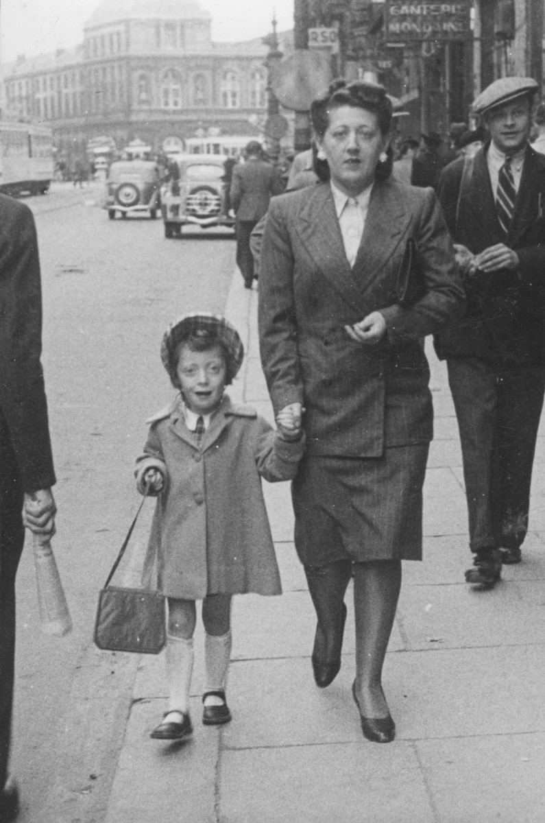Austrian-Jewish refugees walk along a commercial street in central Brussels.

Pictured are the donor's sister and niece, Alice and Erika Trost.  They were deported and killed in Auschwitz.