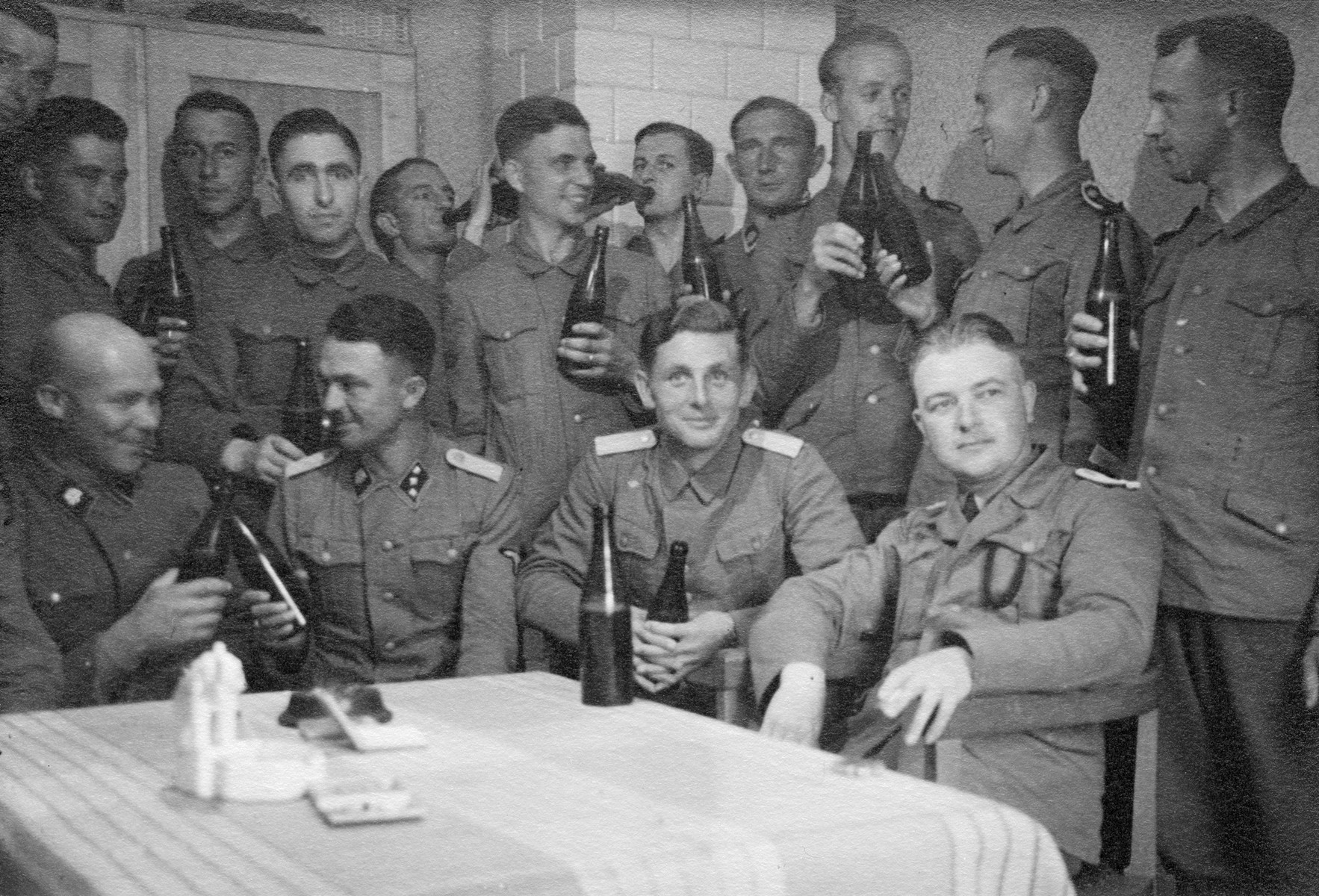 Members of the Waffen-SS enjoy a drink in occupied Poland.