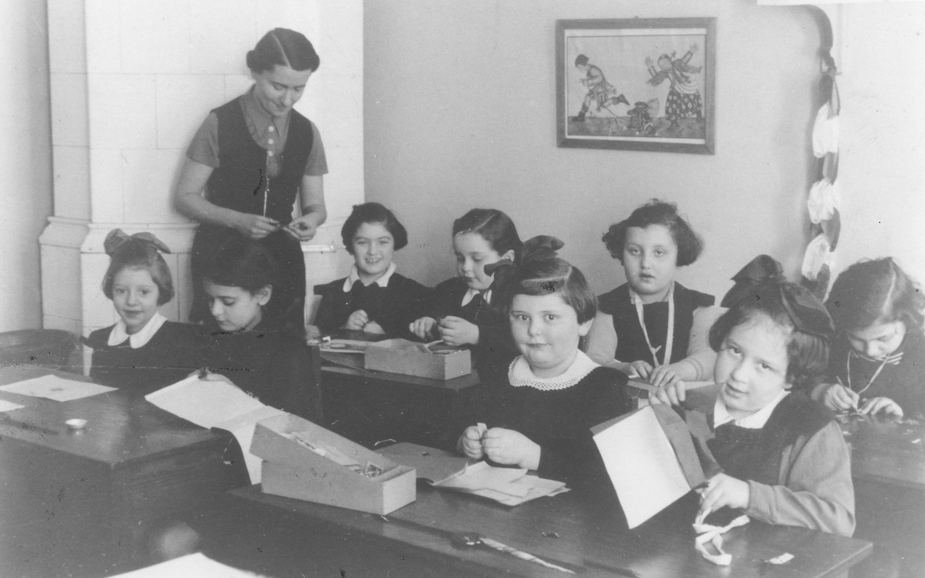 Pupils in the second grade work in their classroom at the Kalecka Jewish elementary school in Warsaw.

Among those pictured is Basia Berkowicz (front row, second from the left).