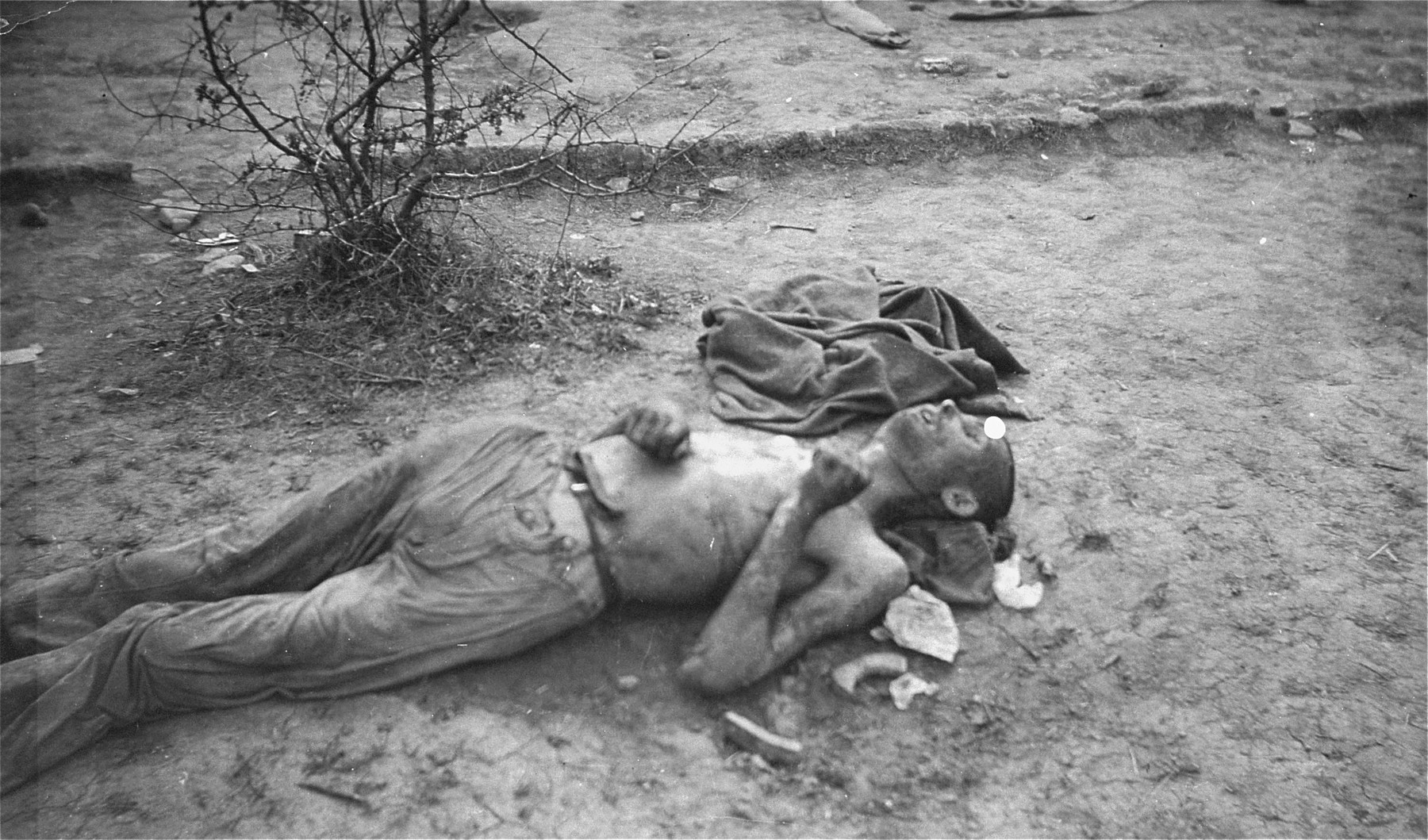 The body of a Polish slave laborer executed by the SS during the evacuation of the Ohrdruf concentration camp.