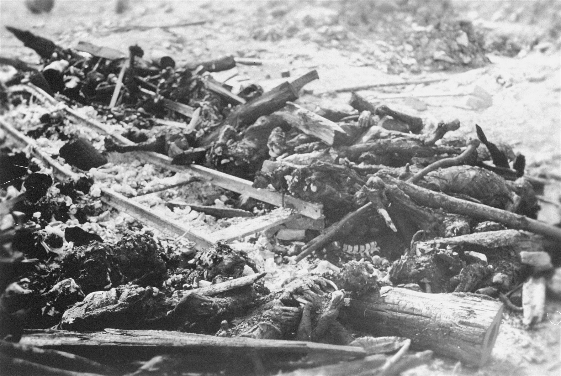 The charred remains of corpses burned by the SS prior to the evacuation of the Ohrdruf concentration camp.