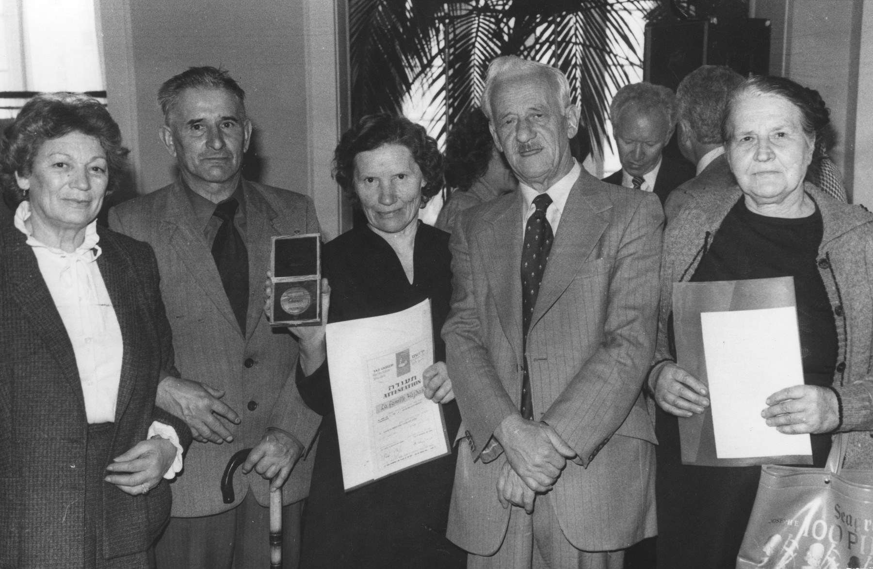 The Hajdas family is awarded the Righteous among the Nations medal from Yad Vashem for their assistance to Polish Jews during the war.  

Among those pictured are Warsaw ghetto fighter, Stefan Grajek (second from the right) and his wife, Uta Grajek (far left).