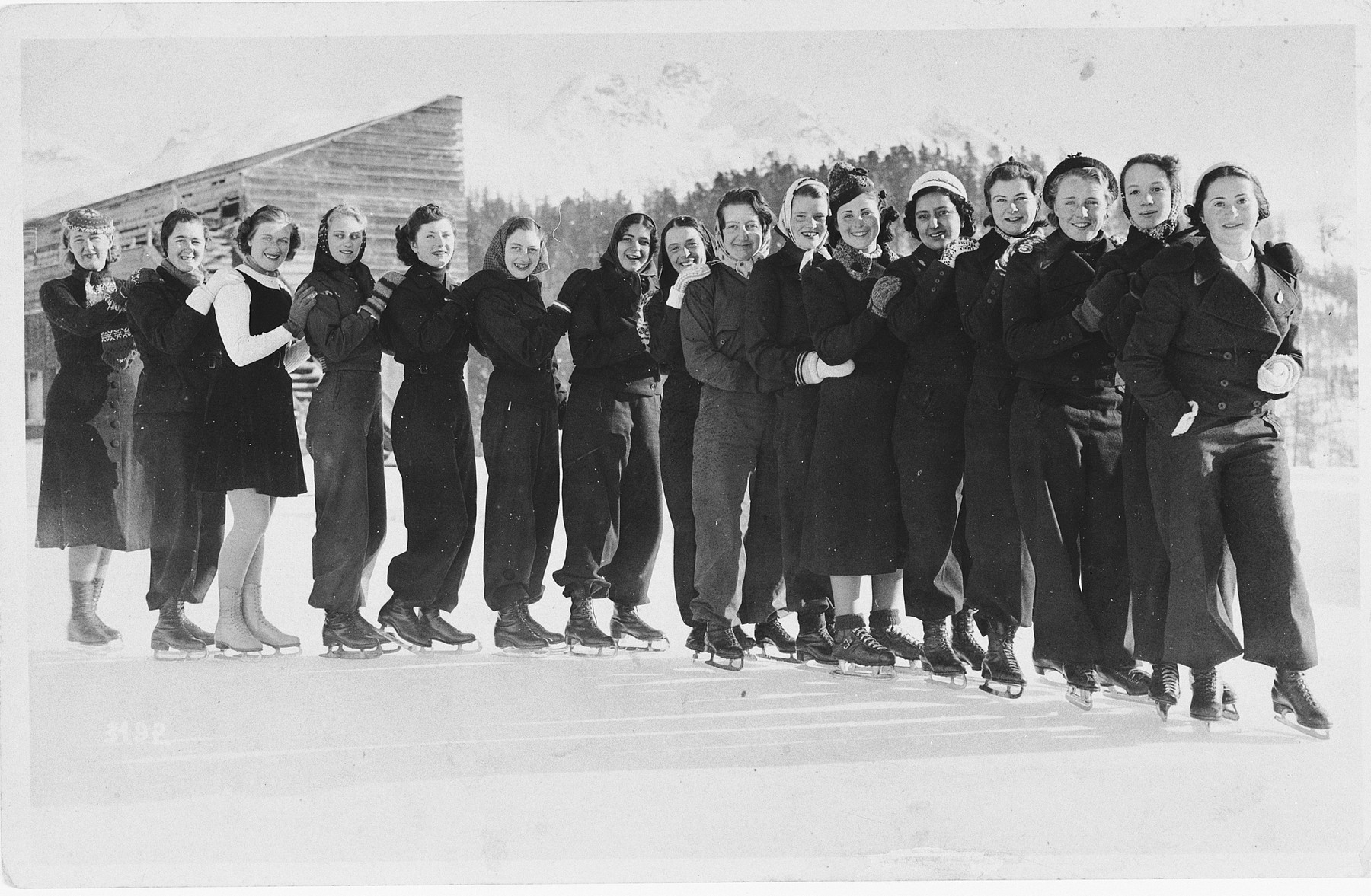 A group of boarding school students go skating together in Saint Moritz.

Among them is Ella Feuerwerk (sixth from the right), an Austrian Jew.