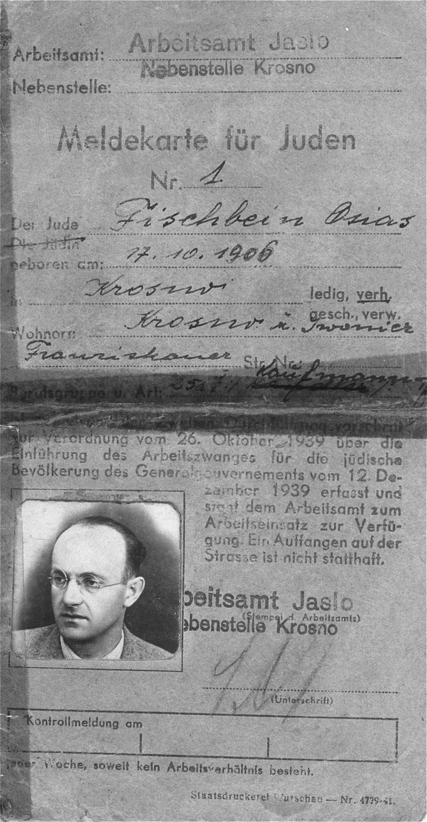 Registration card issued by the labor department of Krosno to Osias Fischbein (b. October 17, 1906).