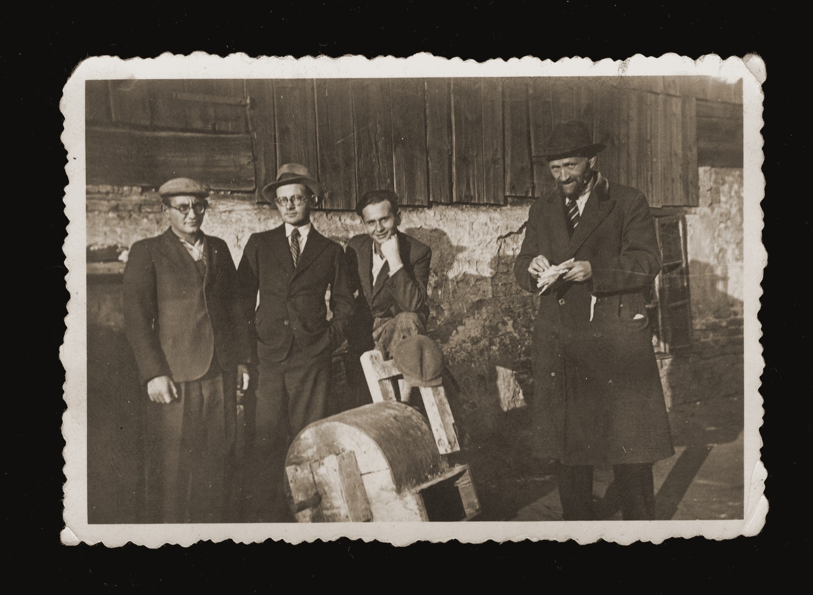 Members of the Feder family pose outside in Dabrowa Gornicza.

Pictured from left to right are Szrage, Mosze, Yehiel and their father, Abraham Yitzhak Feder.