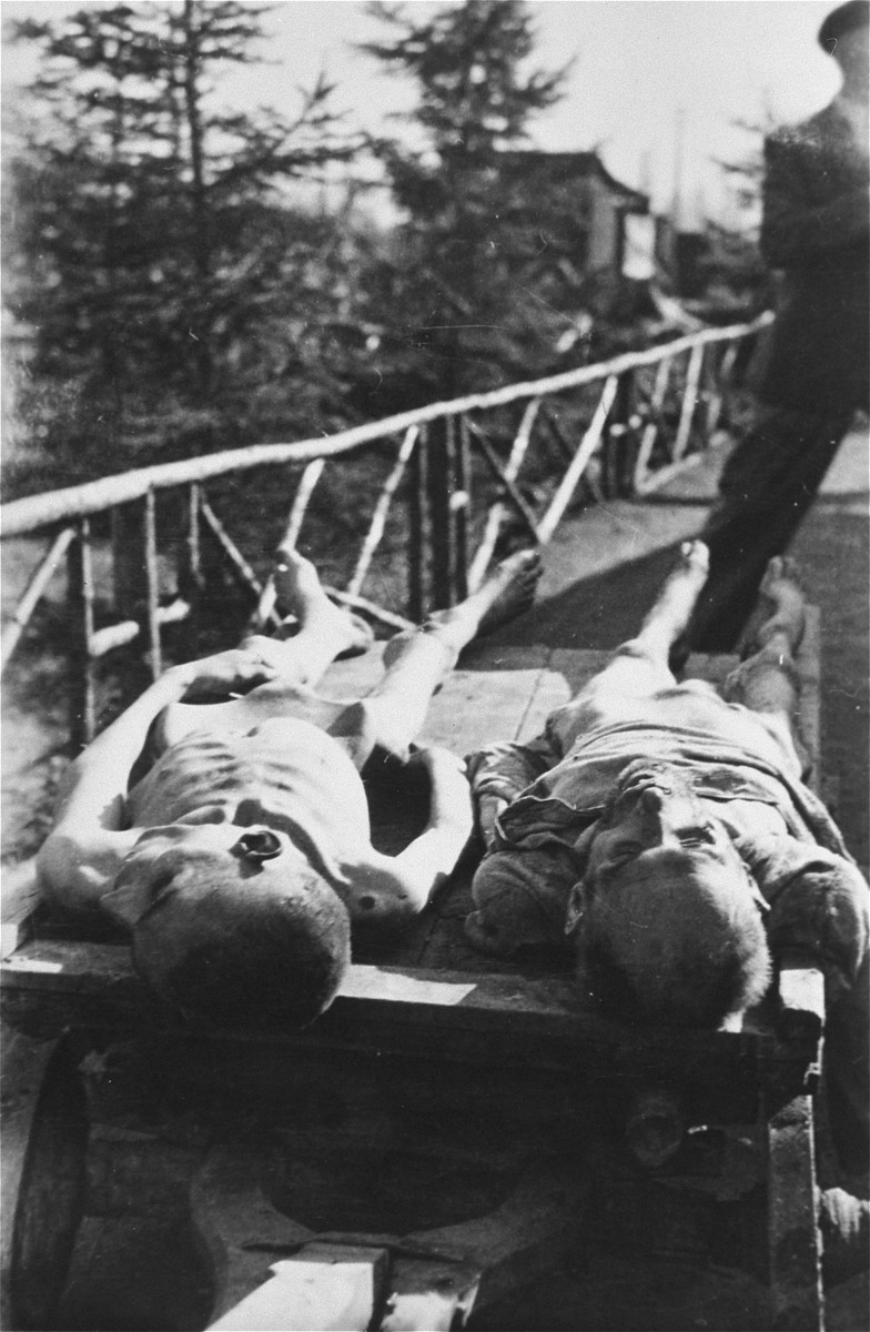 Corpses lie on a cart in Ebensee.
