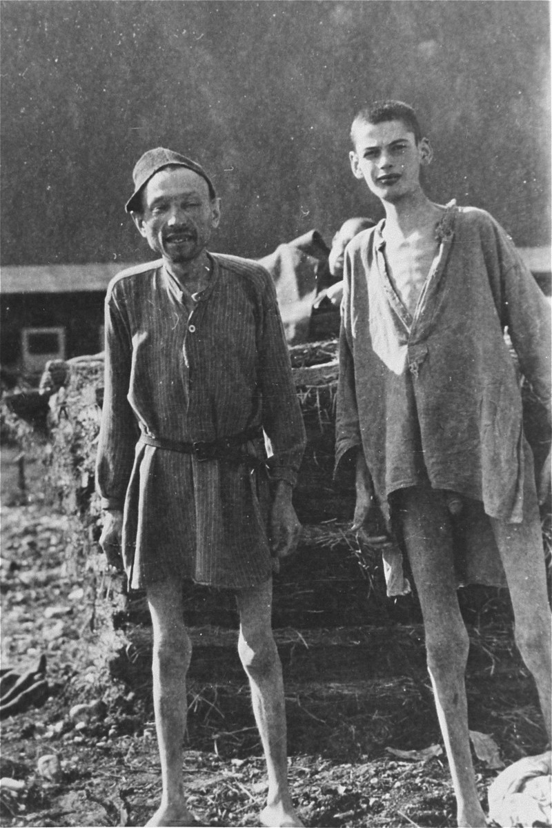 Two emaciated survivors from the infirmary for Jews in Ebensee, a sub-camp of Mauthausen which was liberated by a unit of the 3rd Cavalry Recon. Sqd., U.S. Third Army, on 6 May 1945.