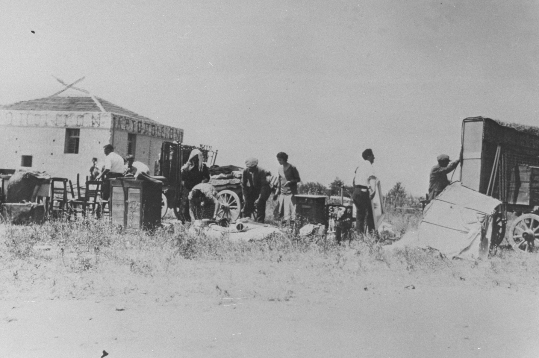 Jews evacuate Camp Campbell after the pogrom of June 29, 1931.