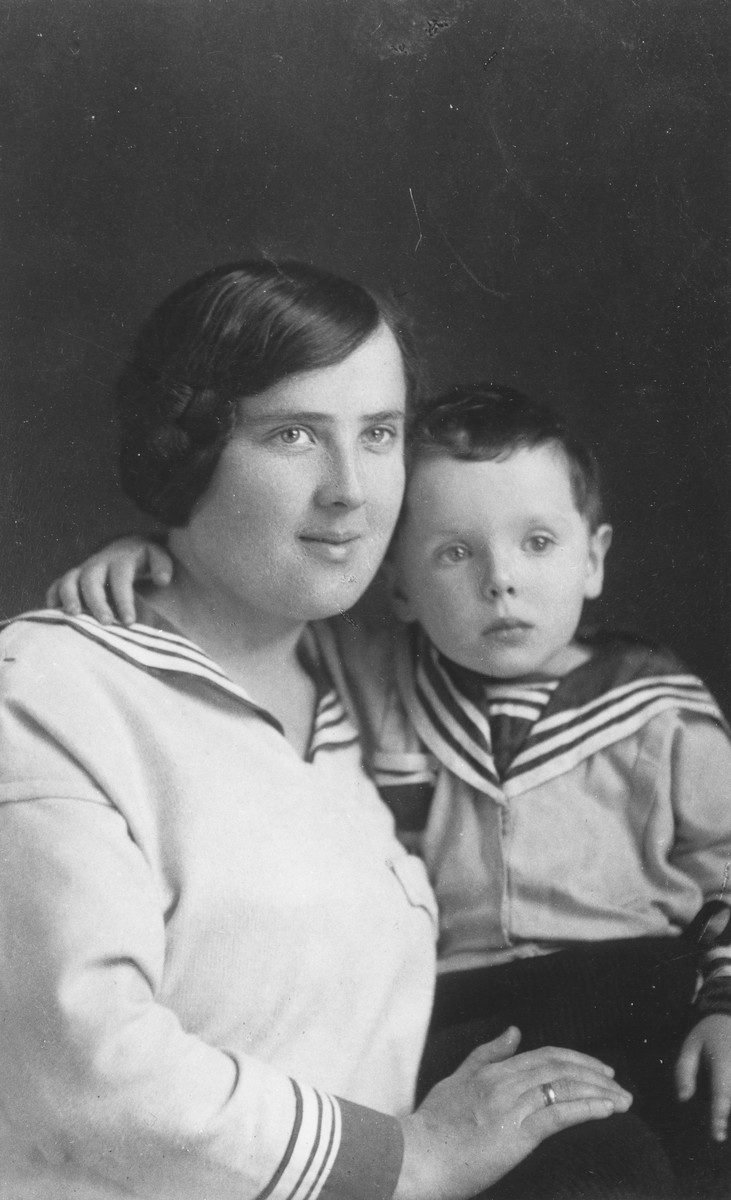 Studio portrait of Sara Limon Tec holding her son, Leon.

Leon attended medical school in Vilna and then immigrated to Palestine in 1940.