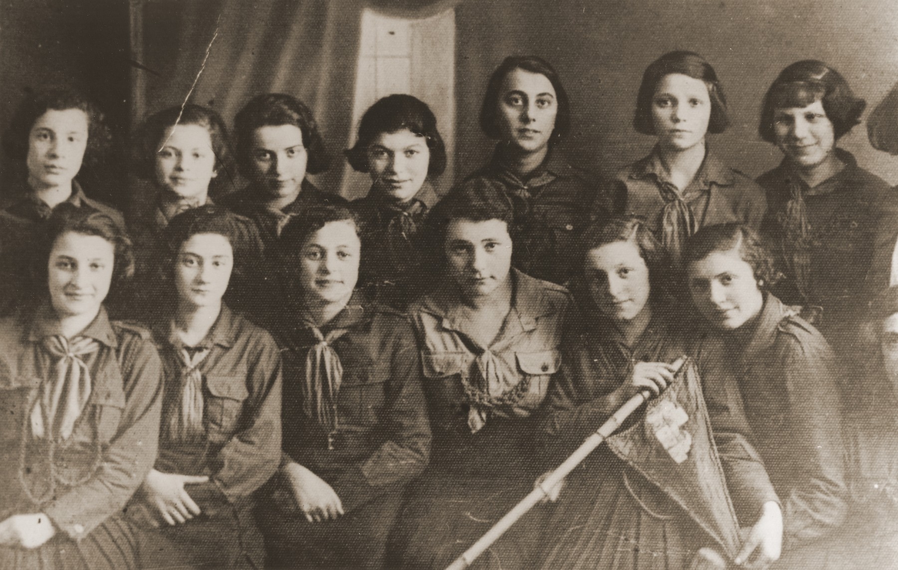 Group portrait of Jewish girls who are members of the "Kwuza Yehudit," a unit of the Hanoar Hatzioni Zionist youth movement in Lodz.

Zofia Zajd is pictured in the second row, third from the right.  Only five of the girls pictured survived the war.