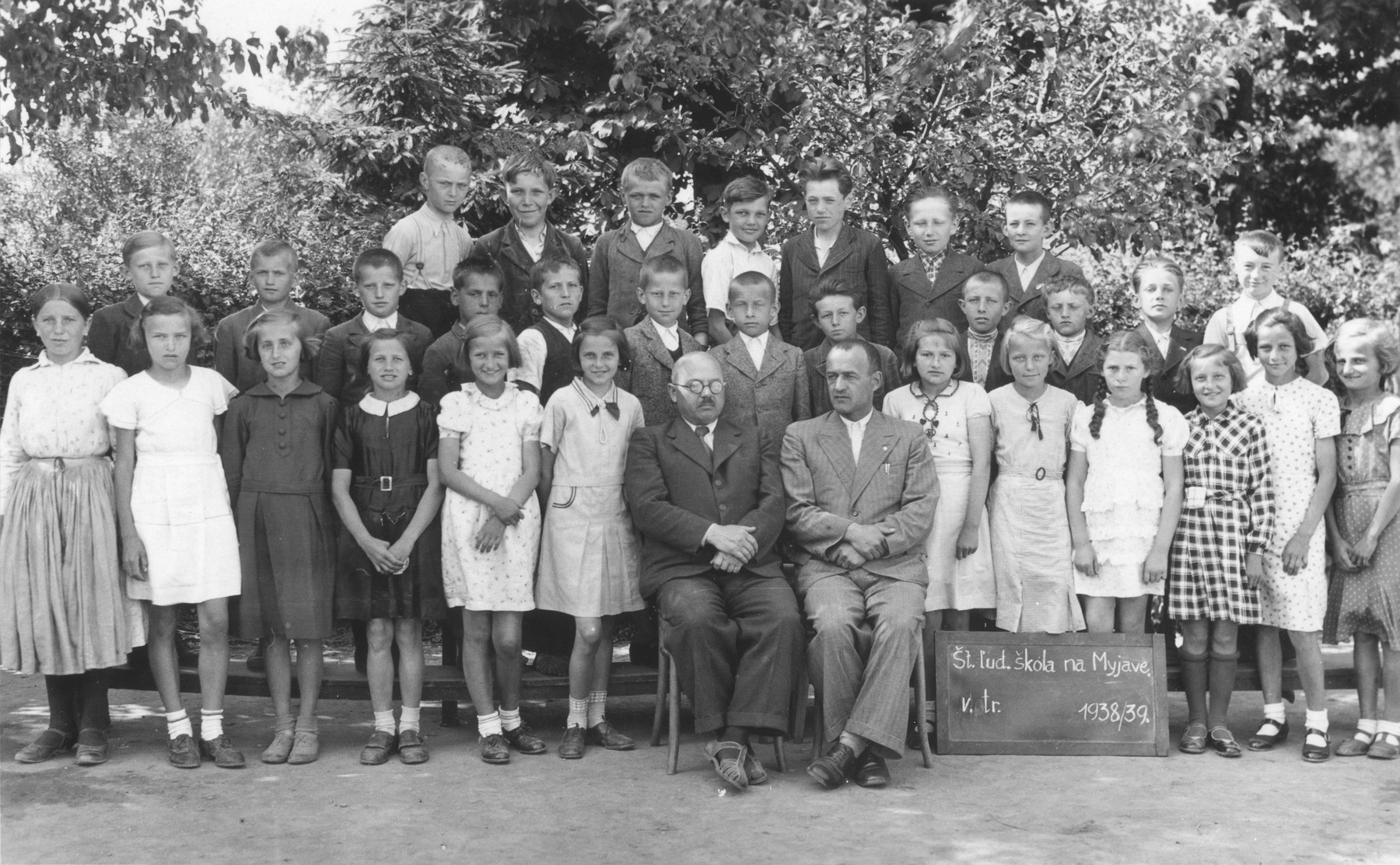 Group portrait of the fifth grade class at the Myjava public school.

Among those pictured is Magdalena Beck (front row, fourth from the right).