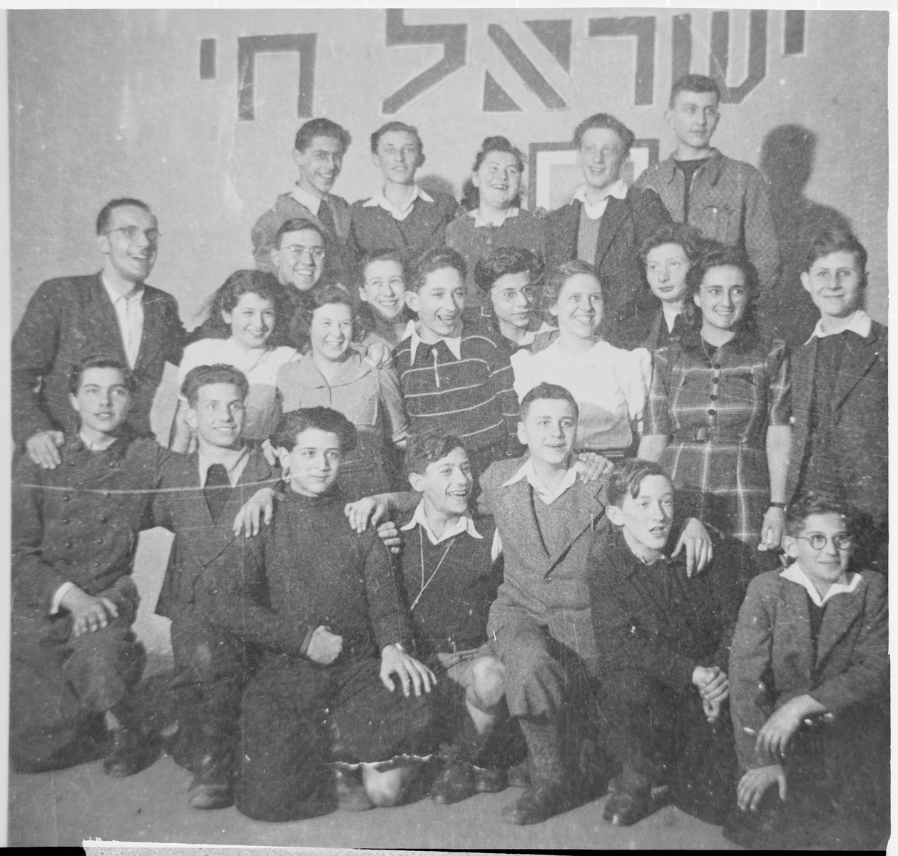 Group portrait of students and teachers at the Youth Aliyah school in Berlin.

Among those pictured is the director of the school, Jizchak Schwersenz (standing at the left).