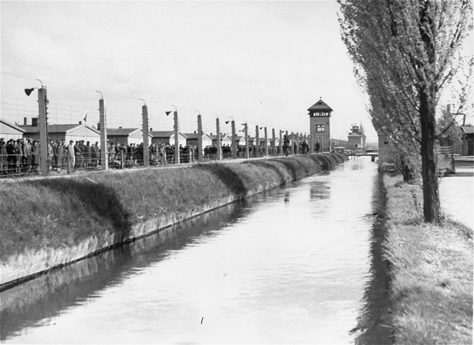 A watch tower and section of the electrified fence in Dachau