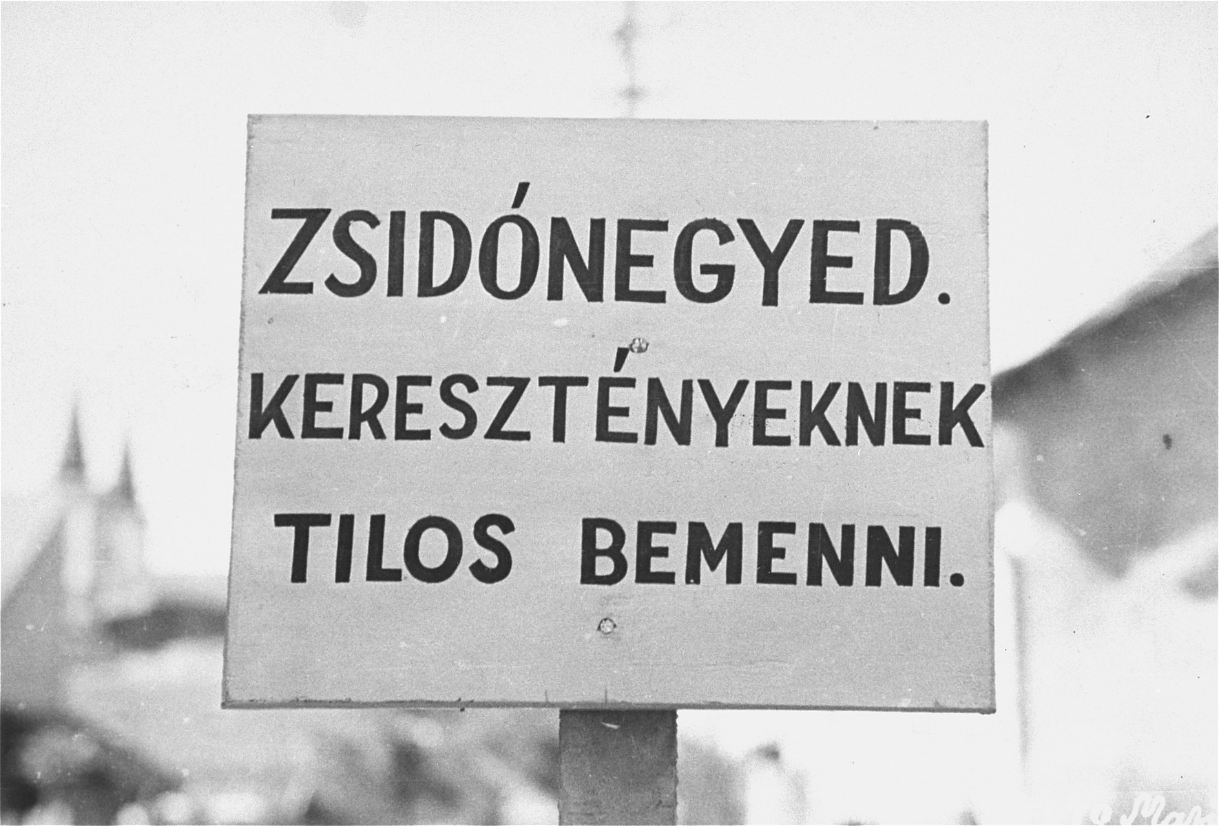 A sign posted at the entrance to the Jewish quarter in Budapest.  The Hungarian text reads, "Entrance forbidden to Christians."