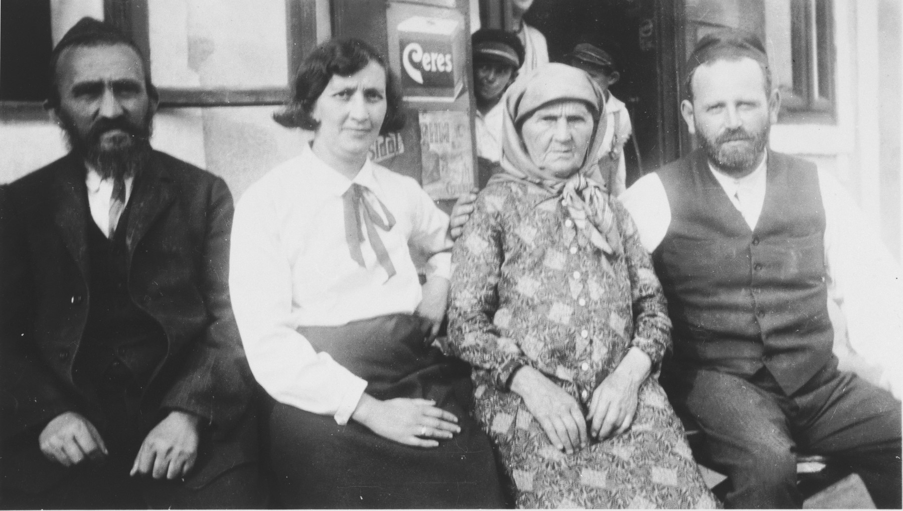 Yetta Beila Gutstein poses with her two sons and daughter-law.

Pictured from left to right are Shmuel Gutstein, his wife Malche, Yetta Beila and Mordecai Gutstein.