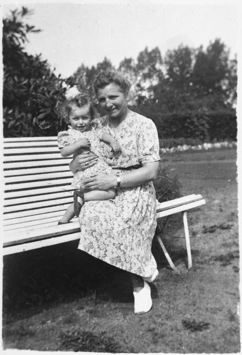 Rescuer, Marie-Josephe Dincq holds Marguerite-Rose Birnbaum in her arms.