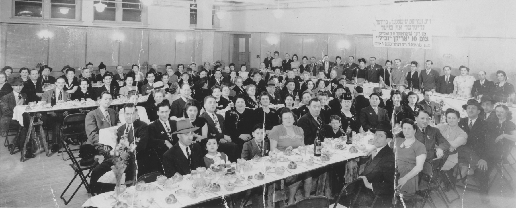 Jewish immigrants to Canada from Ozarow, Poland attend a banquet in Toronto in celebration of the tenth anniversary of the Ozarow society.