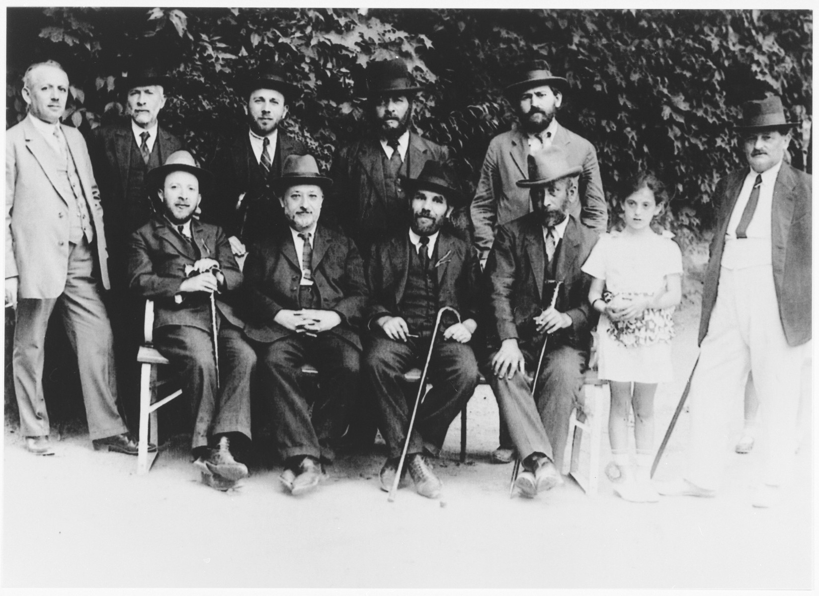 Leaders of the Sighet Jewish community.

Those pictured include Mr. Hershkovich (seated far left), Mr. Klein (seated second from left), Mr. Yacobovich (standing far right) and Mr. Jahan (standing second row, right).