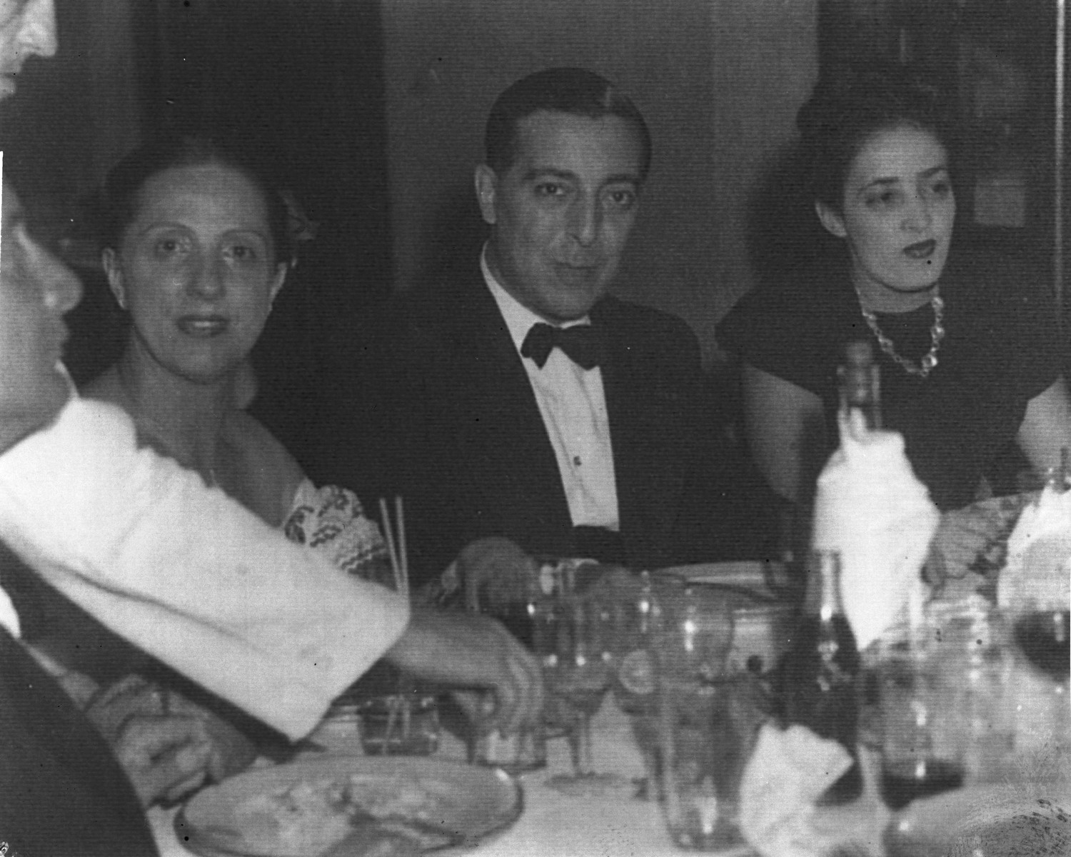 Portuguese diplomat Carlos de Liz-Texeira Branquinho at a dinner party.