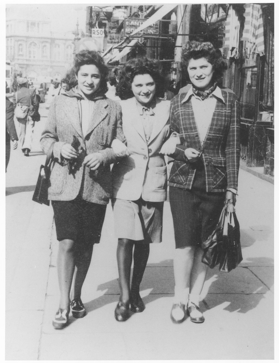 Ida Soldinger (center) walks along a street in Brussels with friends shortly before her deportation to Auschwitz via the Mechelen transit camp.