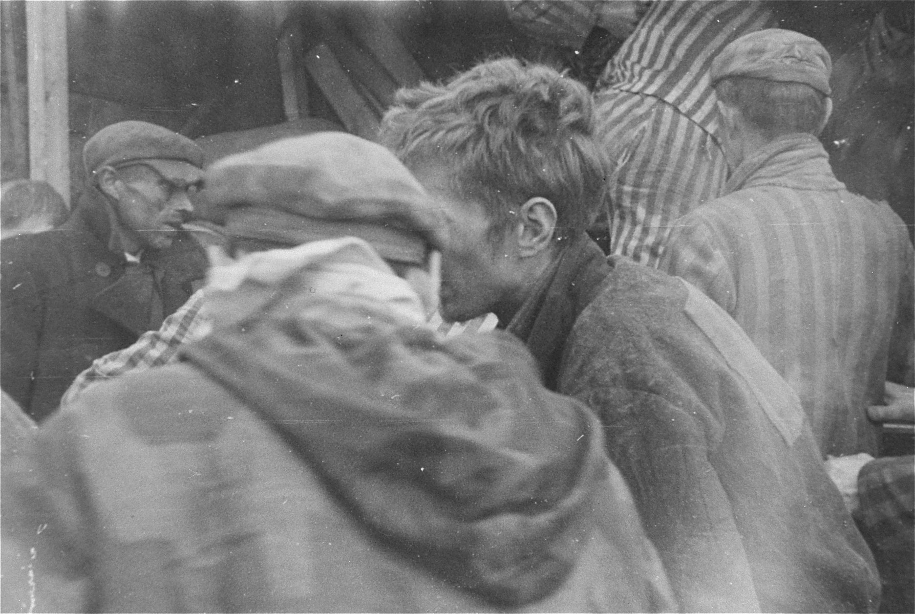 Survivors are evacuated from the Woebbelin concentration camp to an American field hospital where they will receive medical attention.